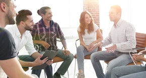Group of people sitting together